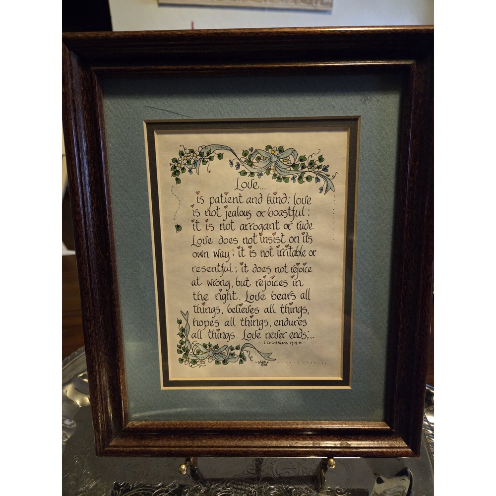 Vintage framed calligraphy print beautifully displays the "Love is patient, love